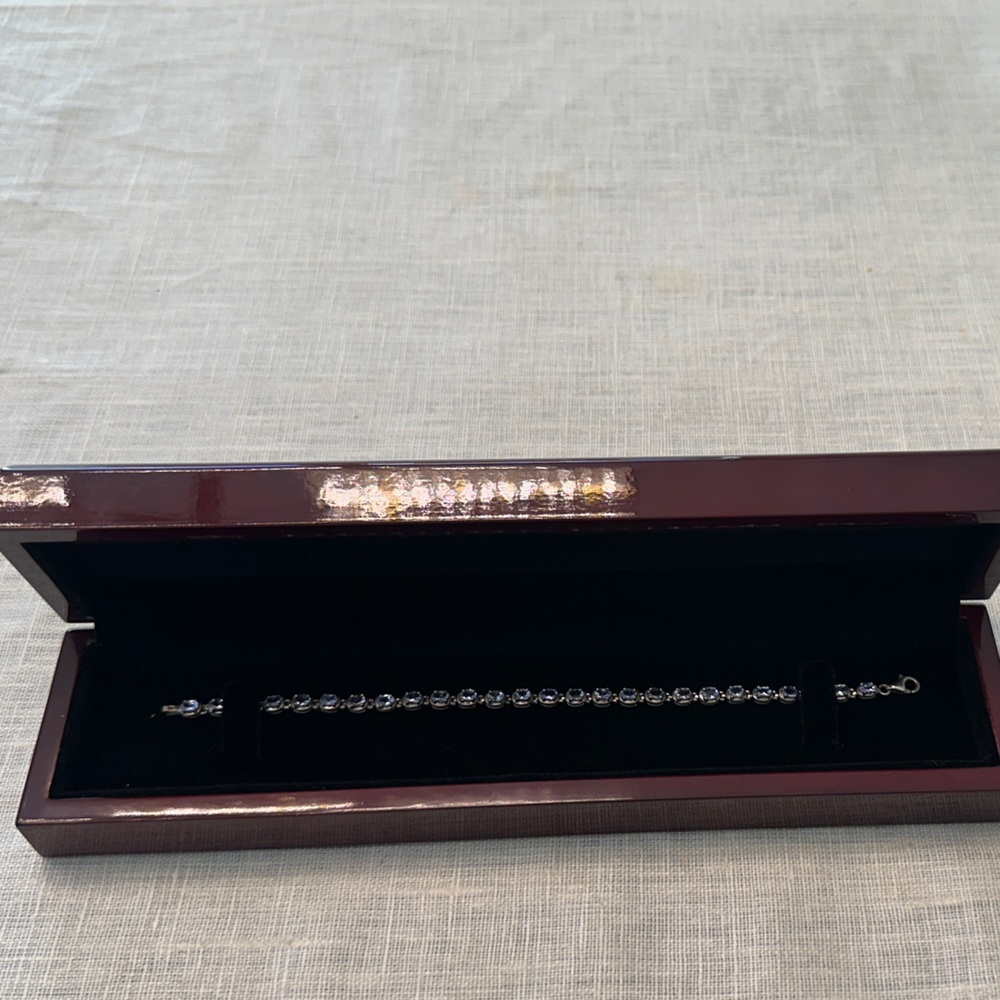 Elegant Silver Bracelet in Brown Box